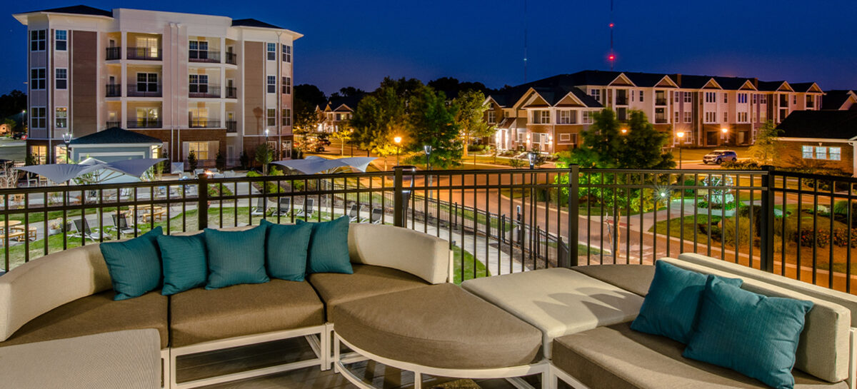 Nighttime photo of a patio overlooking the property