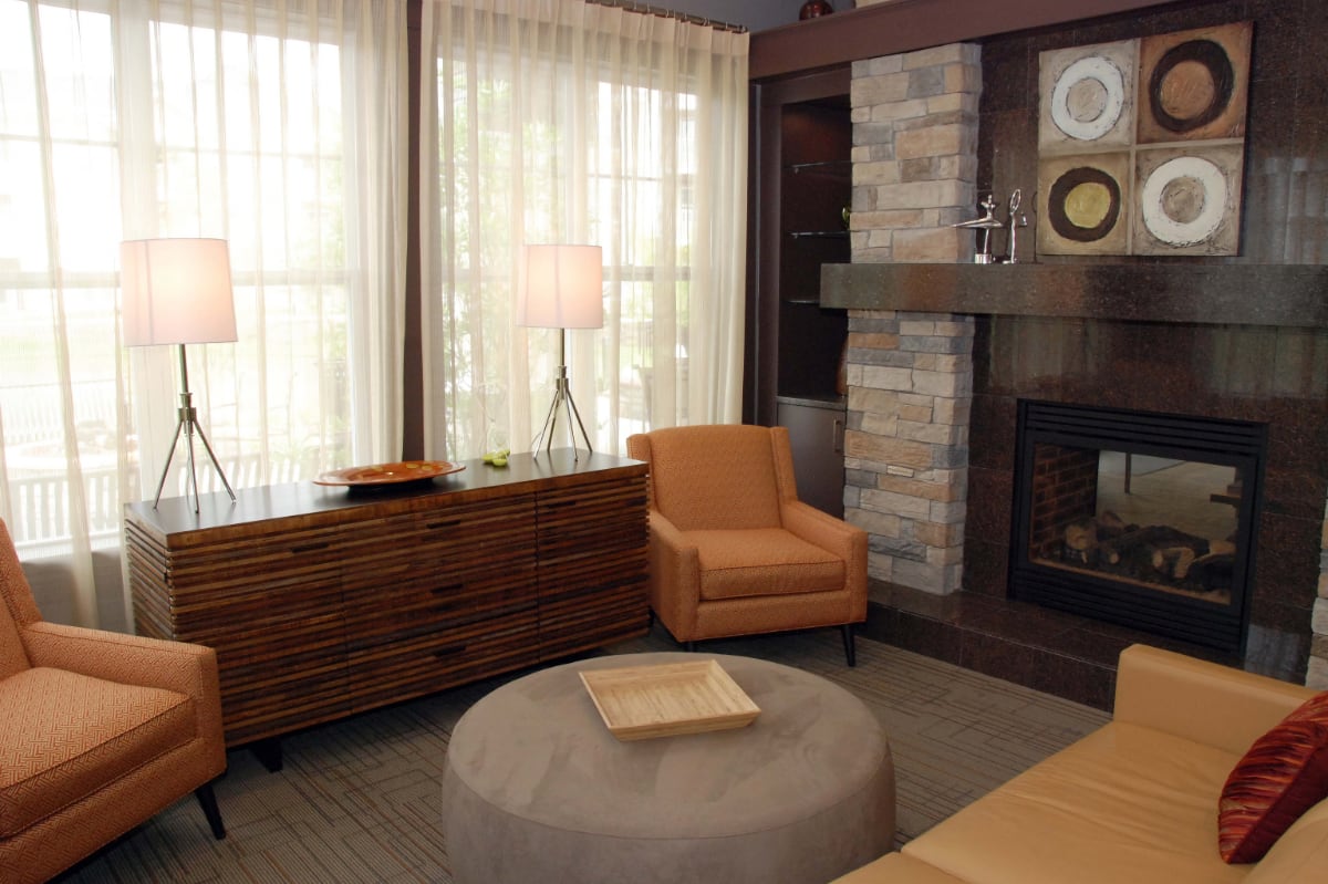 Living room with fireplace and chairs